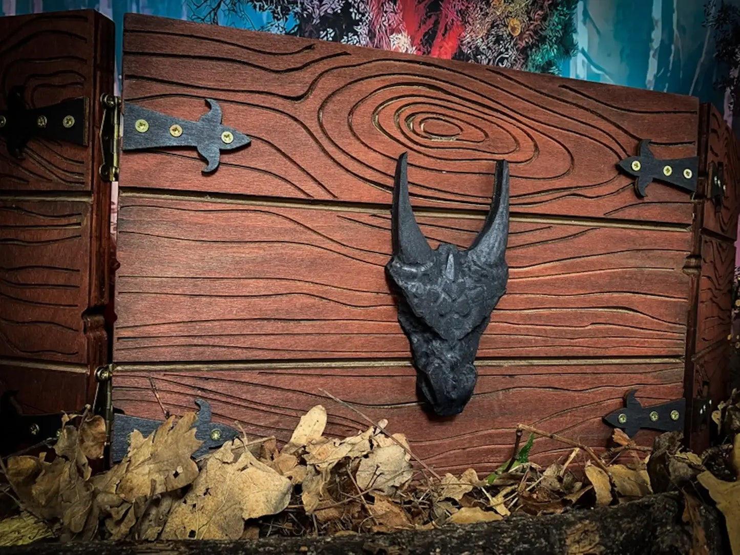 Handcrafted dungeon master screen with dragon head design, featuring wood-like texture and decorative hardware.